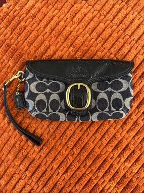 Coach canvas and patent leather Bleecker wristlet with tattersall interior